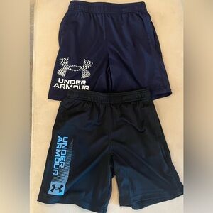 Two pairs of boys Under Armour shorts. Size M